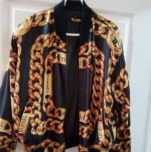 Vintage CHANEL 1980s gold chain bomber jacket